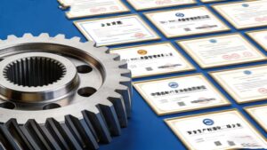 By juxtaposing physical gears with ISO certifications or quality diplomas, it visually proves that manufacturing precision meets rigorous industry standards.